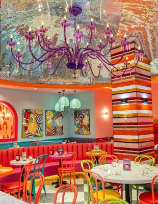 A Room With Tables And Chairs