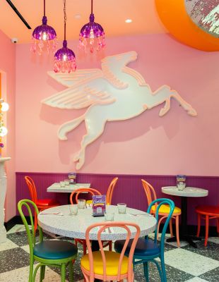 A Room With Tables And Chairs